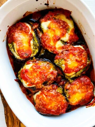 baked eggplant Parmesan stacks in a casserole.